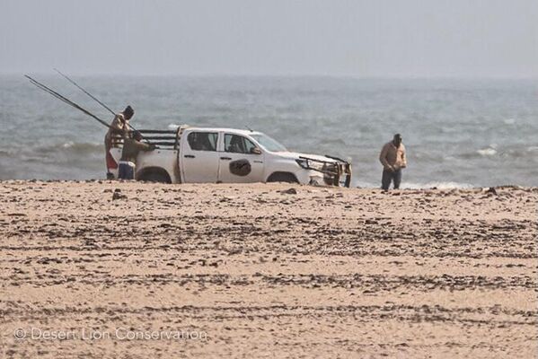 Fishermen in a restricted area of the Skeleton Coast National Park